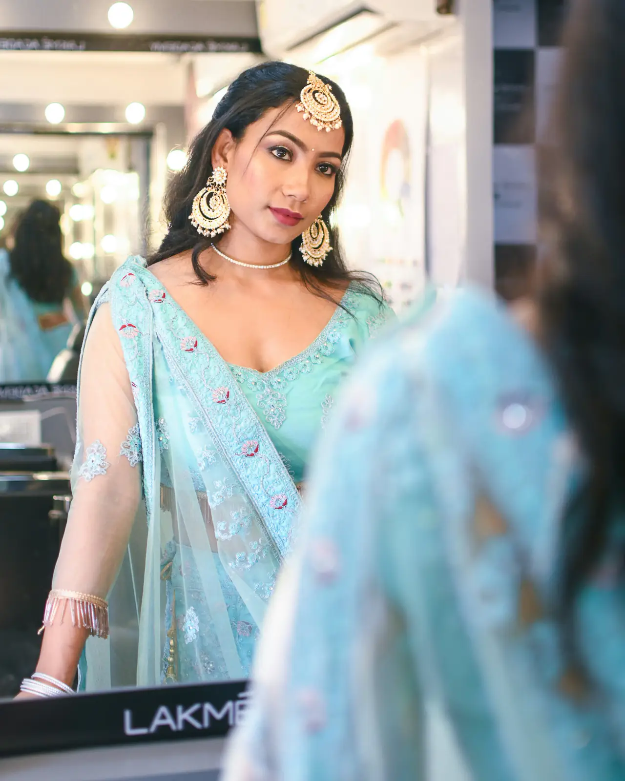 Bride in a pale blue lehenga