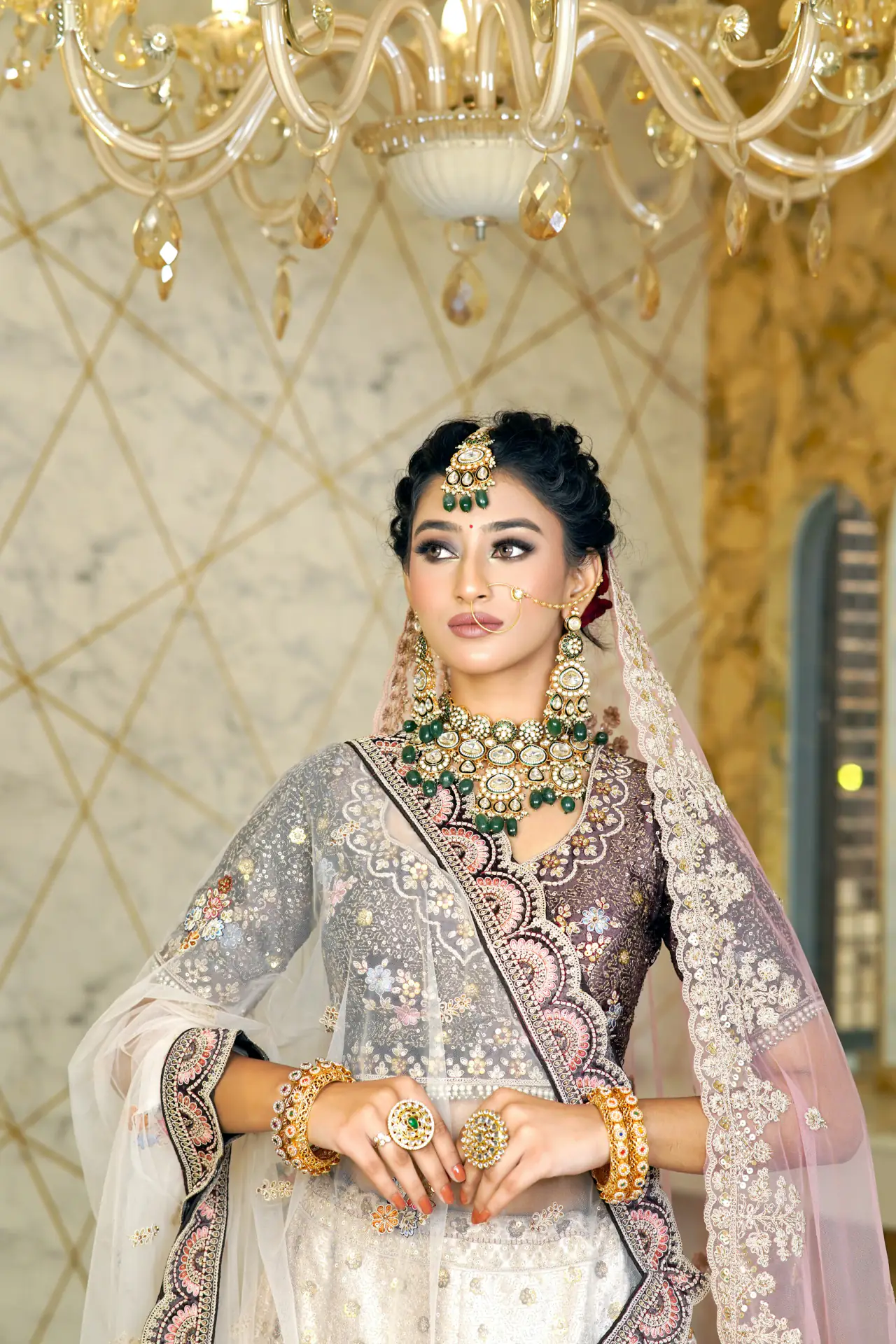 Bride in a silver lehenga
