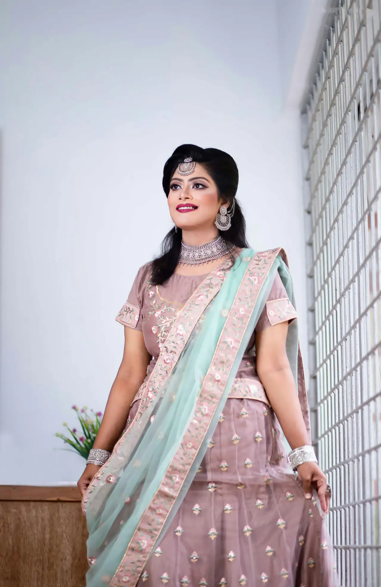 Bride in a mint lehenga